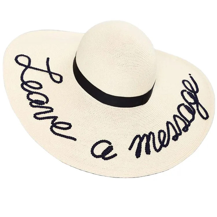 Sombrero de playa para dama de ala ancha con banda bordada con logotipo